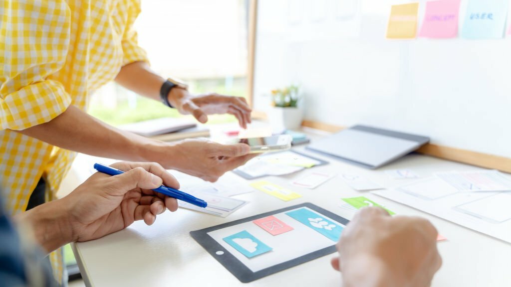 UX UI applications designer working for smart phone interface.